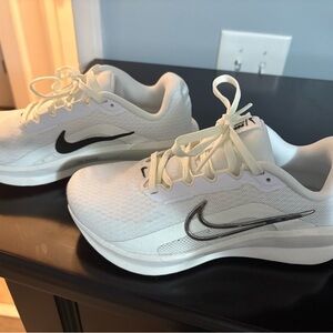 Nike White Athletic Shoes with Black Logo